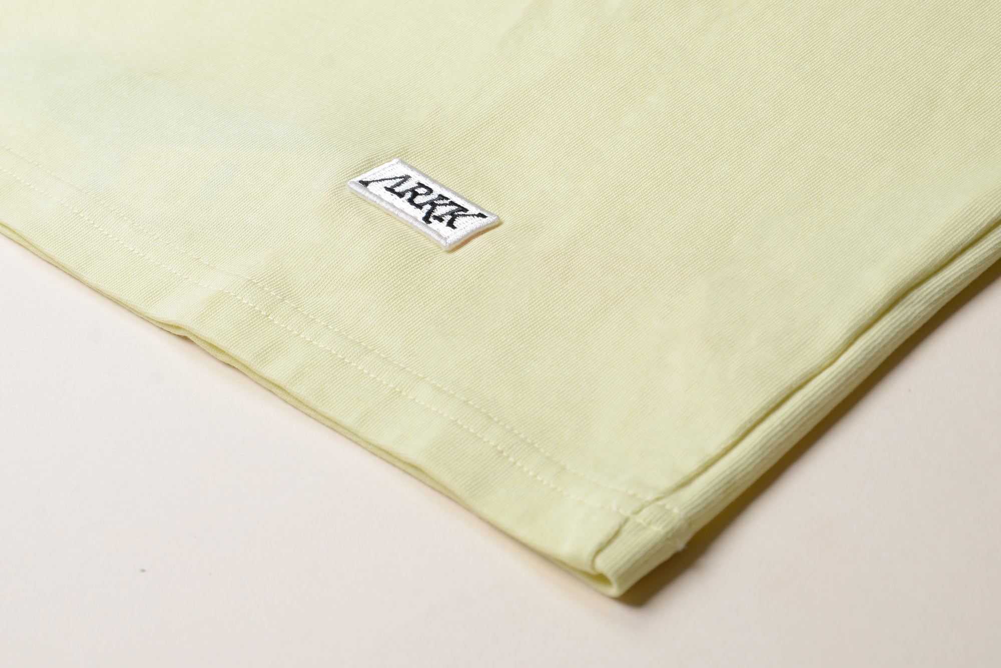 ARKK Apparel ARKK Box Logo Tee | Faded Yellow T-Shirt